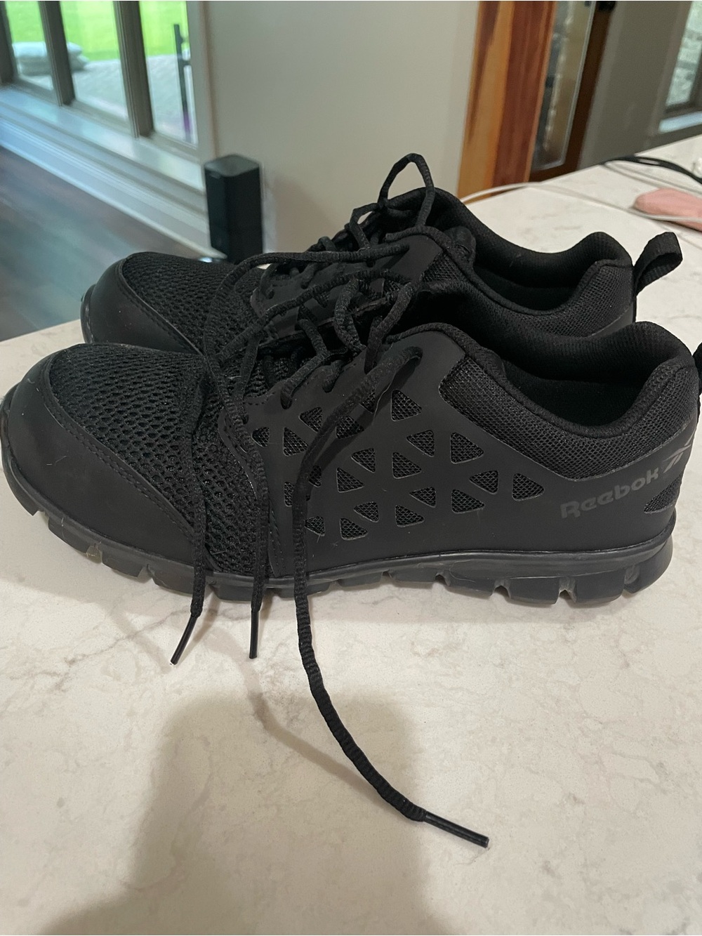 Steel toe Reebok shoes size 9